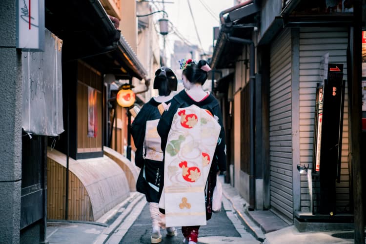 Geishas in Kyoto Alley