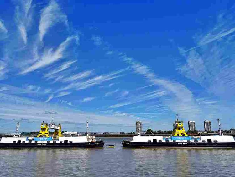 Ferries Under Wispy Sky