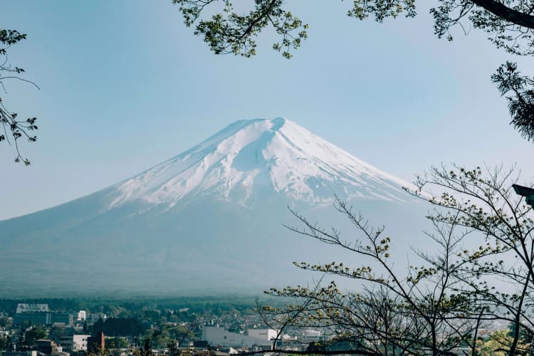 Mount Fuji over cityscape