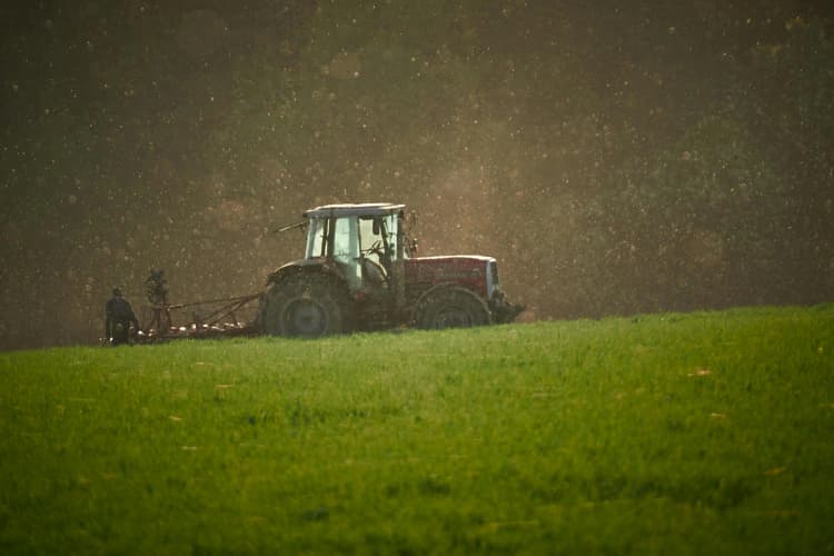 Tractor in Misty Field