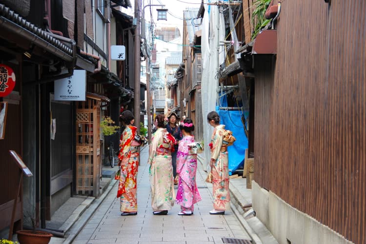 Geishas in Kyoto Alley