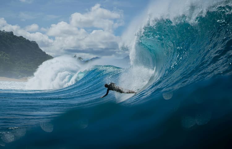 Surfer Rides Massive Wave